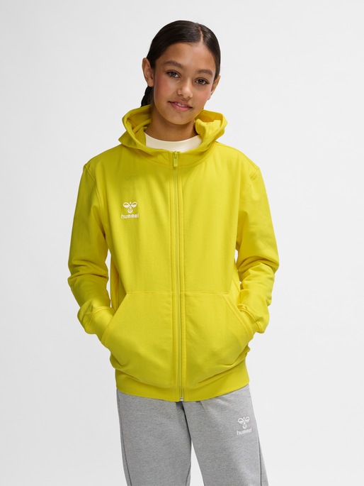 hmlGO 2.0 ZIP HOODIE KIDS, BLAZING YELLOW, model