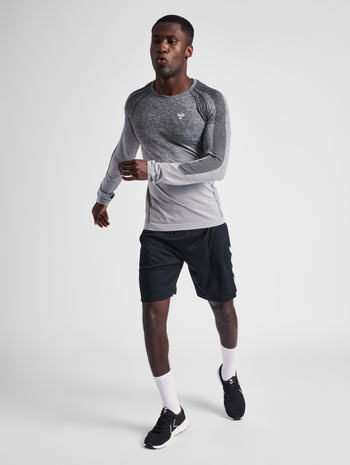 hmlGG12 TRAINING SEAMLESS L/S, BLACK MELANGE, model