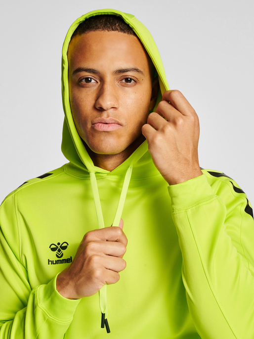 hmlCORE XK POLY SWEAT HOODIE, LIME POPSICLE, model