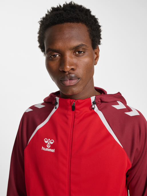 hmlLEAD 2.0 TRACK ZIP JACKET, TRUE RED/MAROON, model