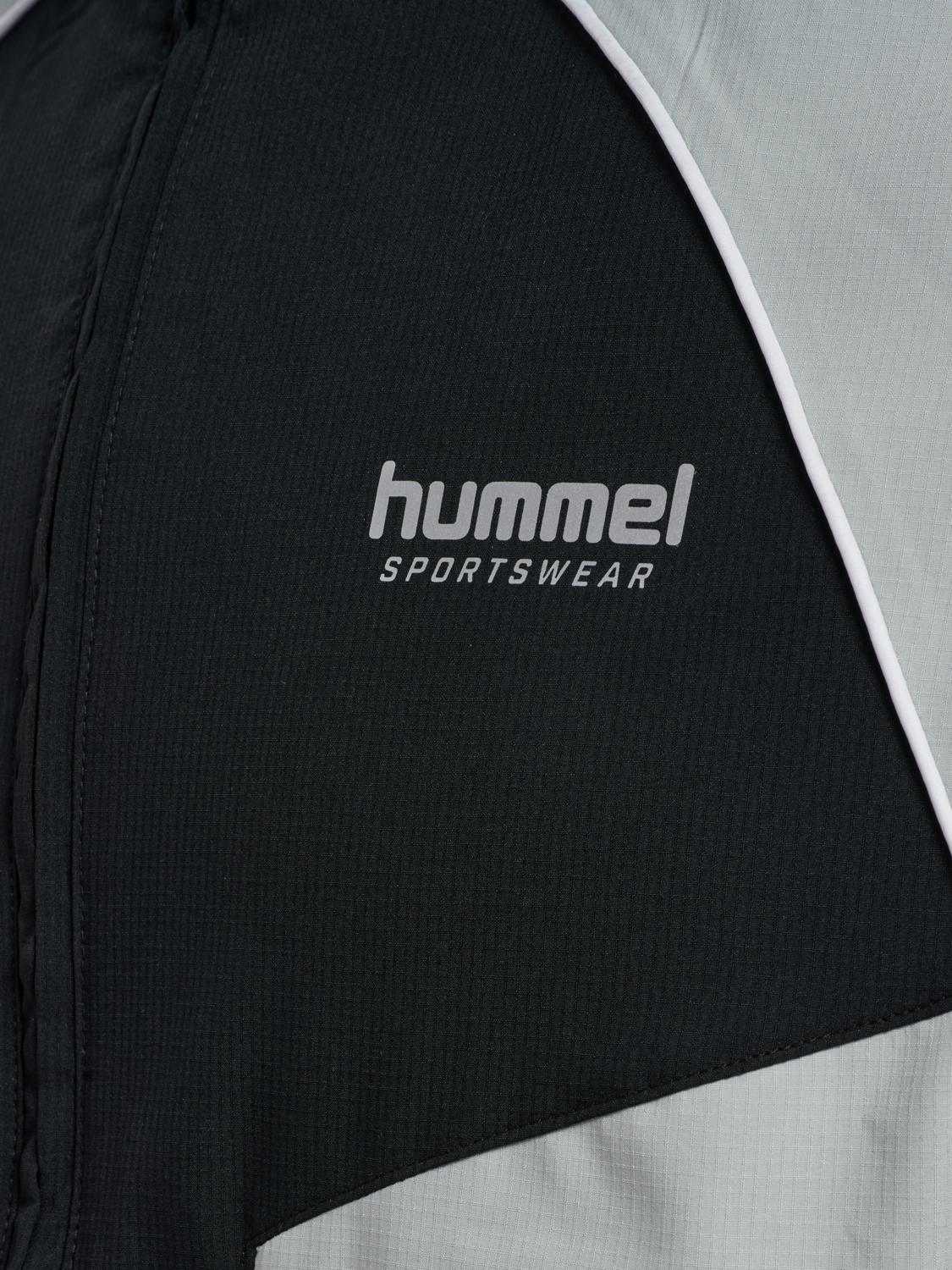 hmlLOOSE TRACK ZIPJACKET SPORTSWEAR, BLACK, packshot