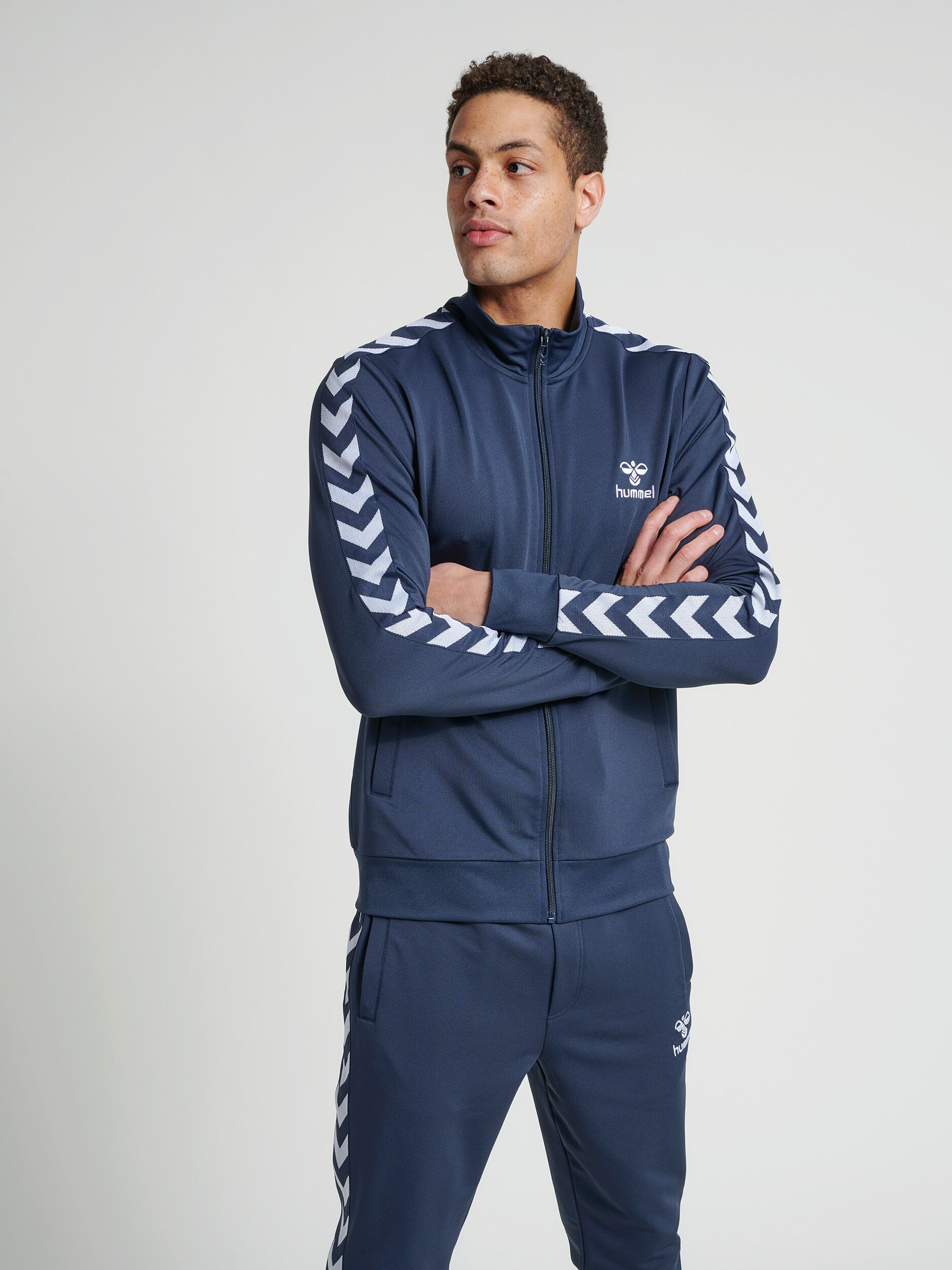 Hummel tracksuit price new arrivals