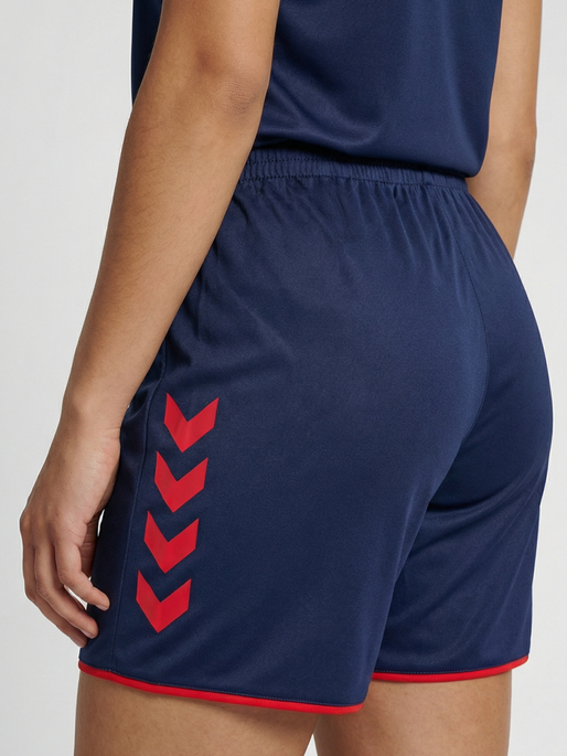 hmlCORE 2.0 SHORTS WOMAN, MARINE/TRUE RED, model