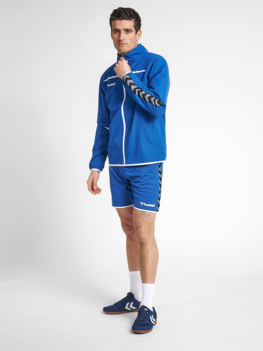 hmlAUTHENTIC TRAINING JACKET, TRUE BLUE, model