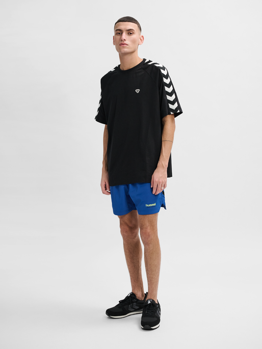 hmlLGC NED SWIM SHORTS, TRUE BLUE, model