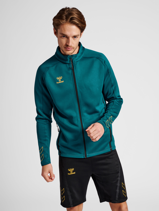 hmlCIMA XK ZIP JACKET, BLUE CORAL, model