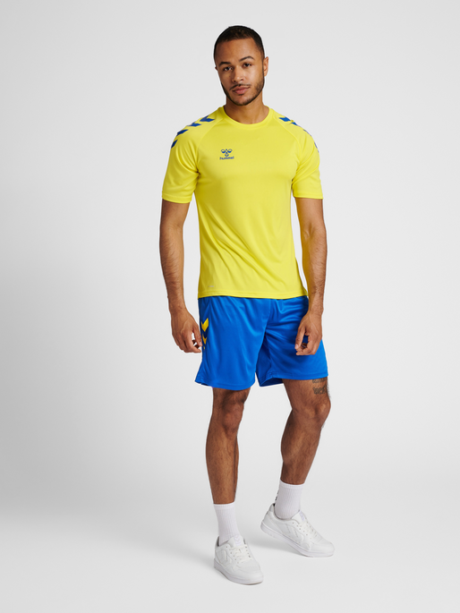 hmlCORE XK CORE POLY T-SHIRT S/S, BLAZING YELLOW/TRUE BLUE, model