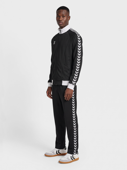 hmlROOT TRACK PANTS, BLACK, model