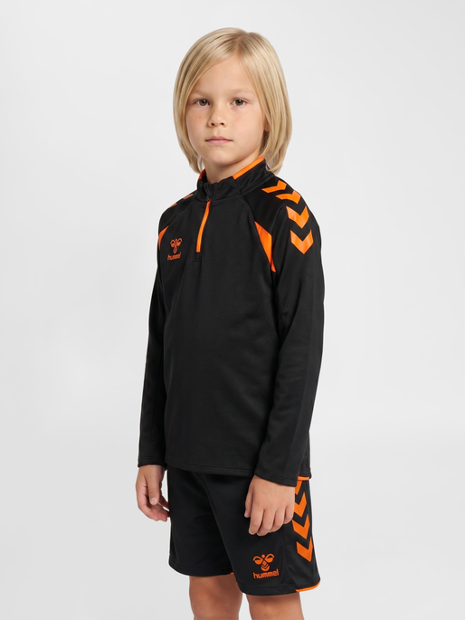 hmlCORE 2.0 HALF ZIP KIDS, BLACK/ORANGE TIGER, model