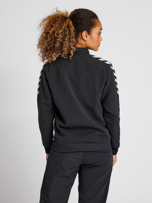 hmlGG12 TRACK JACKET WOMAN, BLACK, model