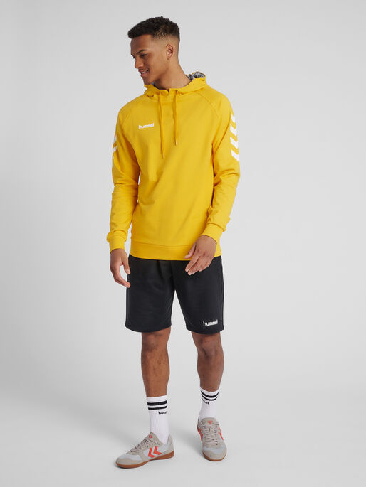 HUMMEL GO COTTON HOODIE, SPORTS YELLOW, model