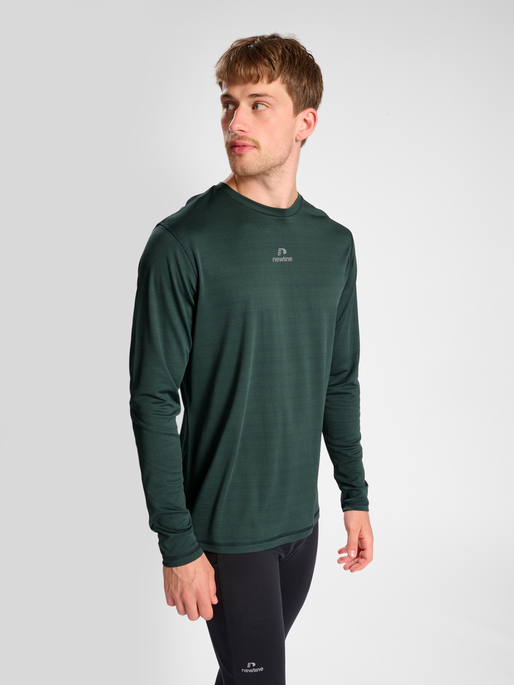 nwlBEAT POLY LS TEE, DARKEST SPRUCE, model