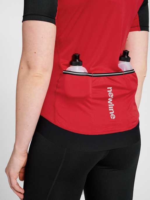 WOMENS CORE BIKE JERSEY, TANGO RED, model